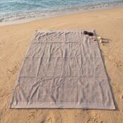 watermarked-img-1791801517394-26-Grey_towel_on_sand_2K_20261011211834