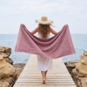 watermarked-img-1791801517394-8-Woman_walking_on_wooden_jetty_2K_20261012145839