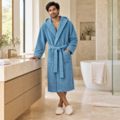 Powder blue bathrobe in a limestone bathroom-1