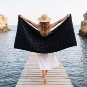 watermarked-img-1791801517394-22-Woman_holding_towel_on_jetty_2K_20261011215409