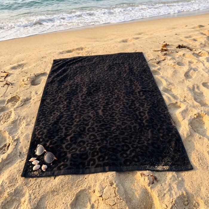 watermarked-img-1791801517394-3-Black_beach_towel_on_sand_2K_20261012153309 watermarked-img-1791801517394-3-Black_beach_towel_on_sand_2K_20261012153309
