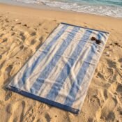 watermarked-img-1791801517394-33-Striped_beach_towel_on_sand_2K_20261011210410