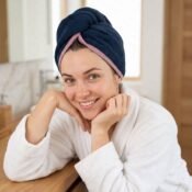 watermarked-img-1791804502415-21-Woman_leaning_on_hands_vanity_2K_20261012172434