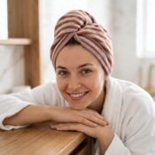 watermarked-img-1791804502415-30-Woman_resting_chin_on_hands_2K_20261012172402