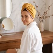 watermarked-img-1791804502415-6-Woman_wearing_hair_towel_wrap_2K_20261012172523